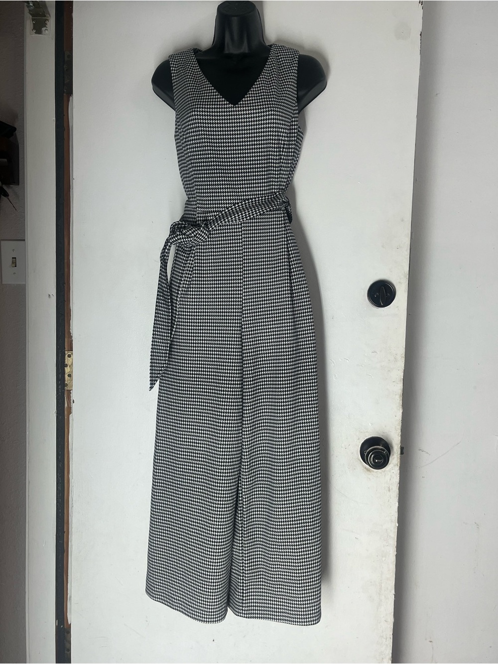 Sleeveless Black & White Houndstooth Wide-Leg Jumpsuit with Tie Waist